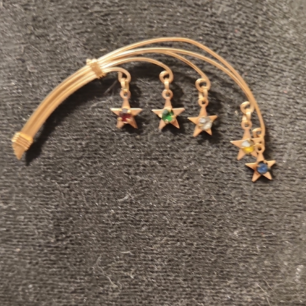 Gold Star Brooch with Multicolor Gem Accents